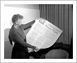 President and Chair of the United Nations Commission on Human Rights, Mrs. Eleanor Roosevelt, looking at the Universal Declaration of Human Rights. Photo: UN.